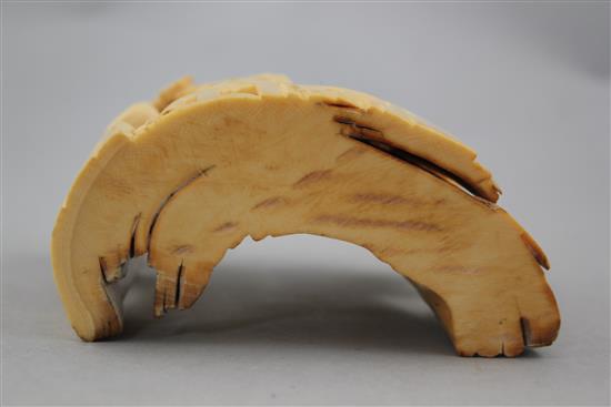 A Chinese mammoth ivory carving of Luohan, 14cm.